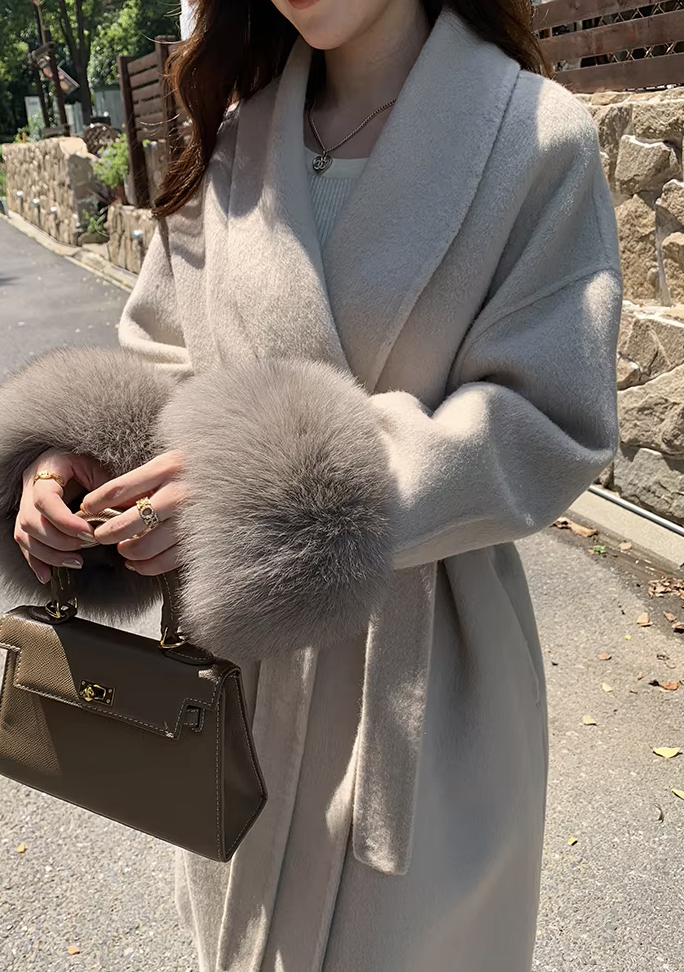 Noémie - Luxe mantel met ceintuur en elegante pasvorm