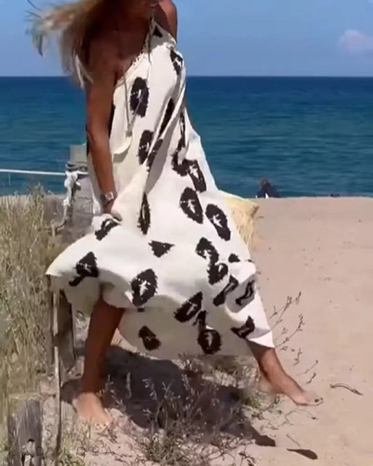 Noor – Zwierige one-shoulder maxi-jurk